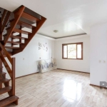 Casa residencial para locação no bairro Cavalhada, com aproximadamente 170m² de área privativa, piso ceramico, 03 dormitorios sendo 02 suites, living 02 ambientes, cozinha americana com pia e armarios