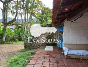 Casa com 4 quartos à venda na Avenida Fioravante Paschoalim, Martim de Sá, Caraguatatuba