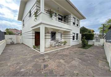 Casa com 4 quartos à venda na rua evaristo da veiga, 226, partenon, porto alegre por r$ 1.150.000