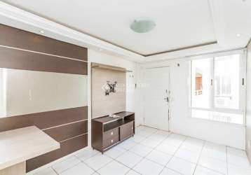 Apartamento com 2 quartos para alugar na rua padre joão batista reus, 3347, camaquã, porto alegre, 55 m2 por r$ 1.500