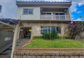 Casa com 4 quartos à venda na rua ibirubá, 232, cavalhada, porto alegre, 250 m2 por r$ 750.000