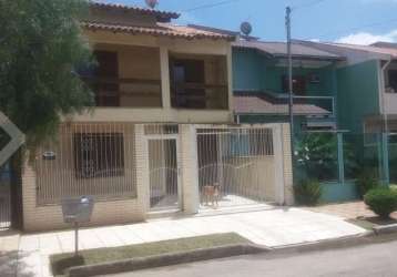 Casa em condomínio fechado com 3 quartos à venda na canarios, 597, porto verde, alvorada, 145 m2 por r$ 450.000