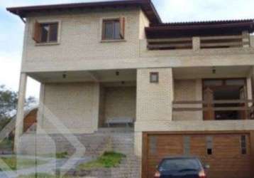 Casa em condomínio fechado com 3 quartos à venda na estrada capitão gentil machado de godoy, 4500, vila elsa, viamão, 400 m2 por r$ 750.000
