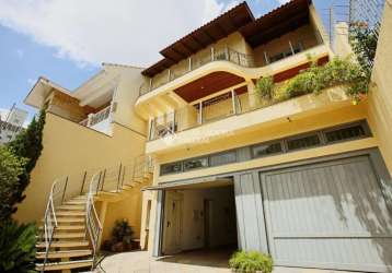 Casa com 5 quartos à venda na rua isidoro tressi, 507, jardim botânico, porto alegre, 379 m2 por r$ 1.700.000