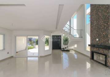 Casa em condomínio fechado com 4 quartos à venda na joao-de-barro, 788, branquinha, viamão, 284 m2 por r$ 1.800.000