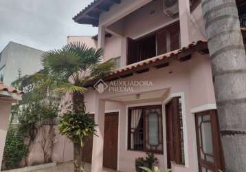 Casa em condomínio fechado com 3 quartos à venda na avenida doutor sezefredo azambuja vieira, 2553, estância velha, canoas, 185 m2 por r$ 1.594.000