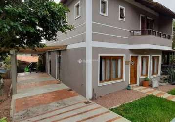 Casa em condomínio fechado com 4 quartos à venda na caroba (cantegril ii), 247, cantegril, viamão, 260 m2 por r$ 900.000