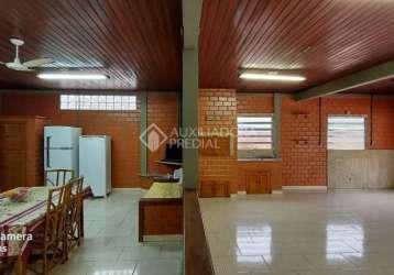 Casa em condomínio fechado com 2 quartos à venda na Rua Felipe Camarão, 222, Tarumã, Viamão, 246 m2 por R$ 490.000