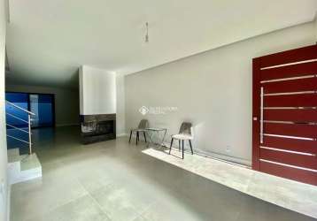 Casa em condomínio fechado com 3 quartos à venda na rua embira, 34, hípica, porto alegre, 121 m2 por r$ 624.000