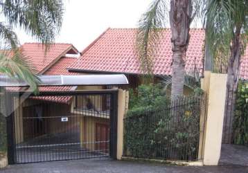 Casa em condomínio fechado com 4 quartos à venda na rua gramado, 478, ouro branco, novo hamburgo, 380 m2 por r$ 1.350.000
