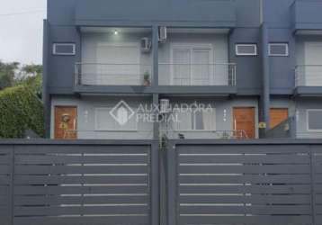 Casa em condomínio fechado com 3 quartos à venda na rua balduino weber, 357, feitoria, são leopoldo, 125 m2 por r$ 495.000