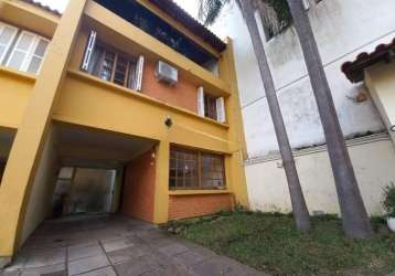 Casa em condomínio fechado com 3 quartos à venda na rua general gomes carneiro, 80, medianeira, porto alegre, 166 m2 por r$ 580.000