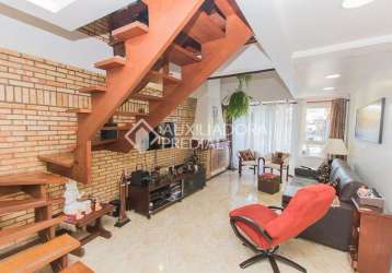 Casa em condomínio fechado com 3 quartos à venda na avenida copacabana, 358, tristeza, porto alegre, 177 m2 por r$ 1.195.000
