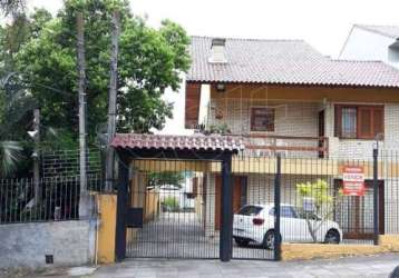 Casa com 3 dormitórios para alugar, 396 m² por r$ 2.200,00/mês - cavalhada - porto alegre/rs