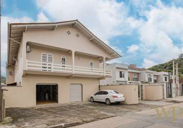 Casa com 4 quartos à venda na rua seara, 125, iririú, joinville por r$ 1.099.000