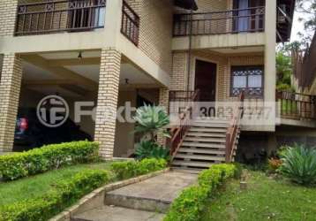 Casa com 3 quartos à venda na Rua Fernando de Andrade Prates, Centro, Viamão, 162 m2 por R$ 680.000