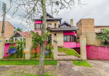 Casa em condomínio fechado com 4 quartos à venda na rua jacarandá, 240, santo onofre, viamão, 334 m2 por r$ 850.000