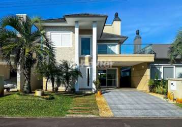 Casa em condomínio fechado com 4 quartos à venda na rua paraguassú, s/n, atlântida sul (distrito), osório, 239 m2 por r$ 1.690.000