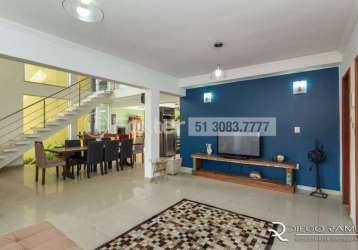Casa em condomínio fechado com 4 quartos à venda na rua cangerana, 210, são lucas, viamão, 332 m2 por r$ 1.100.000