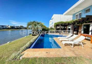 Casa em condomínio fechado com 5 quartos à venda na Avenida Central, Atlântida, Xangri-Lá, 400 m2 por R$ 4.560.000