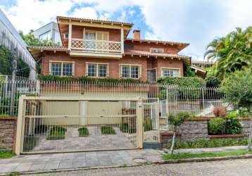 Casa em condomínio fechado com 4 quartos à venda na rua de la grange, 339, três figueiras, porto alegre por r$ 4.950.000