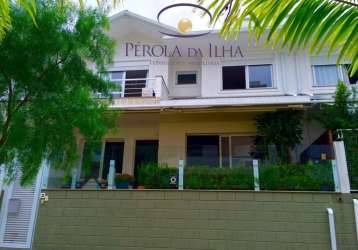 Casa com 3 quartos à venda na rua das piraúnas, 845, jurerê internacional, florianópolis por r$ 2.255.000