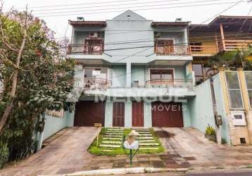 Casa em condomínio fechado com 3 quartos à venda na rua antonio delapieve, 80, mário quintana, porto alegre por r$ 550.000