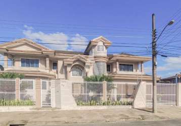 Casa com 4 quartos à venda na rua montezuma de carvalho, 56, iririú, joinville por r$ 1.550.000