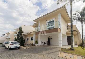 Casa em condomínio fechado com 3 quartos à venda na rua luiz bachtold, 626, costa e silva, joinville por r$ 870.000