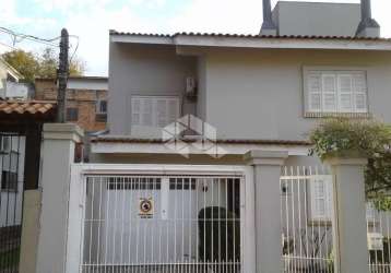 Casa com 3 quartos à venda na rua mathilde zatar, 261, nonoai, porto alegre, 290 m2 por r$ 1.500.000