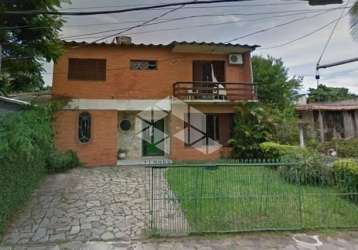 Casa com 3 quartos à venda na rua jacundá, 670, guarujá, porto alegre, 245 m2 por r$ 530.000