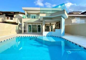 Casa com piscina, com 4 quartos (4 suítes) à venda, 250 m² por r$ 1.700.000 - balneário praia do pernambuco - guarujá/sp – imobiliária mercuri