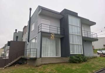 Casa em condomínio fechado com 3 quartos à venda na rua antônio baggio, 100, loteamento jardim timbaúva, gravataí por r$ 850.000