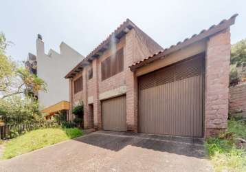 Casa com 4 quartos à venda na rua sílvio silveira soares, 2396, camaquã, porto alegre por r$ 800.000