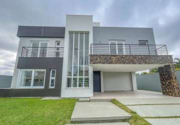 Casa em condomínio fechado com 4 quartos à venda na avenida juca batista, 8000, belém novo, porto alegre por r$ 2.500.000