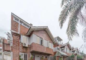 Casa em condomínio fechado com 3 quartos à venda na rua carajá, 105, vila assunção, porto alegre por r$ 949.000