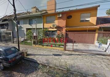Casa em condomínio fechado com 3 quartos à venda na rua professor guerreiro lima, 1026, partenon, porto alegre por r$ 850.000