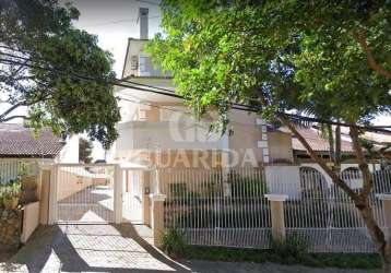Casa em condomínio fechado com 3 quartos à venda na rua doutor guilherme schultz filho, 80, jardim isabel, porto alegre por r$ 850.000
