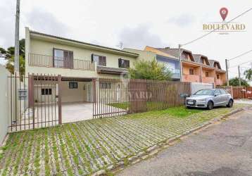 Terreno com dois sobrados, com 4 dormitórios à venda, 397 m² por r$ 1.480.000 - guabirotuba - curitiba/pr