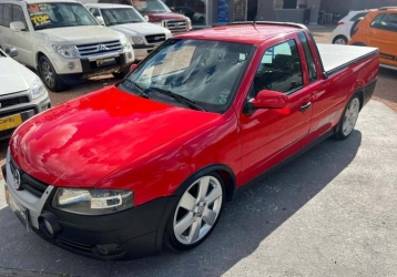 Carro Volkswagen Saveiro G4 Surf (Rebaixada com som/moto na capota