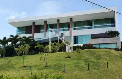 Mansão exclusiva com vista panorâmica para o mar no litoral norte.