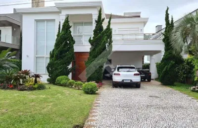 Casa em condomínio fechado com 4 quartos à venda na central, 2500, centro, xangri-lá por r$ 4.500.000