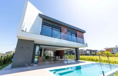 Casa em condomínio fechado com 6 quartos à venda na rua rio jacuí, 1244, centro, xangri-lá por r$ 6.990.000