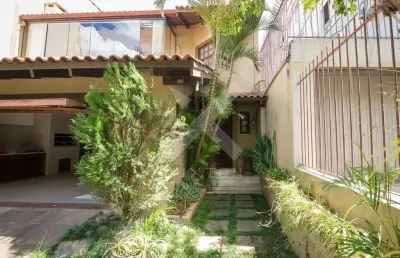 Casa com 4 quartos à venda na rua coronel paulino teixeira, 327, rio branco, porto alegre por r$ 1.600.000