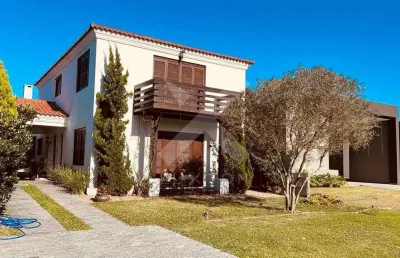 Casa em condomínio fechado com 4 quartos à venda na avenida diamante, 1173, rainha do mar, xangri-lá por r$ 1.590.000