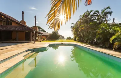 Casa com 6 quartos para alugar na rua coroados, 1135, vila assunção, porto alegre por r$ 25.000