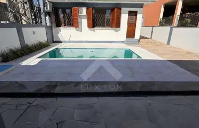 Casa com 3 quartos à venda na engenheiro ary de abreu lima, 311, jardim europa, porto alegre por r$ 1.190.000