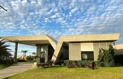 Casa em condomínio fechado com 4 quartos à venda na avenida diamante, 1173, centro, xangri-lá por r$ 1.990.000