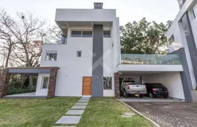 Casa em condomínio fechado com 3 quartos para alugar na avenida coronel marcos, 1239, pedra redonda, porto alegre por r$ 25.000