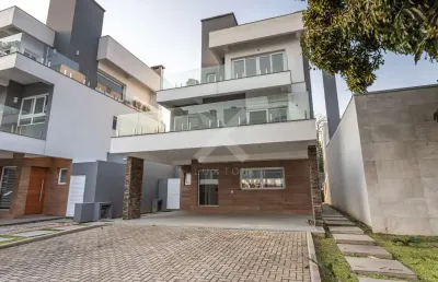 Casa em condomínio fechado com 3 quartos para alugar na avenida coronel marcos, 1239, pedra redonda, porto alegre por r$ 19.900